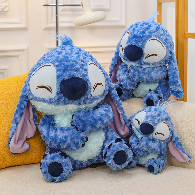 Peluche Stitch douce et moelleuse - Bleu avec sourire endormi