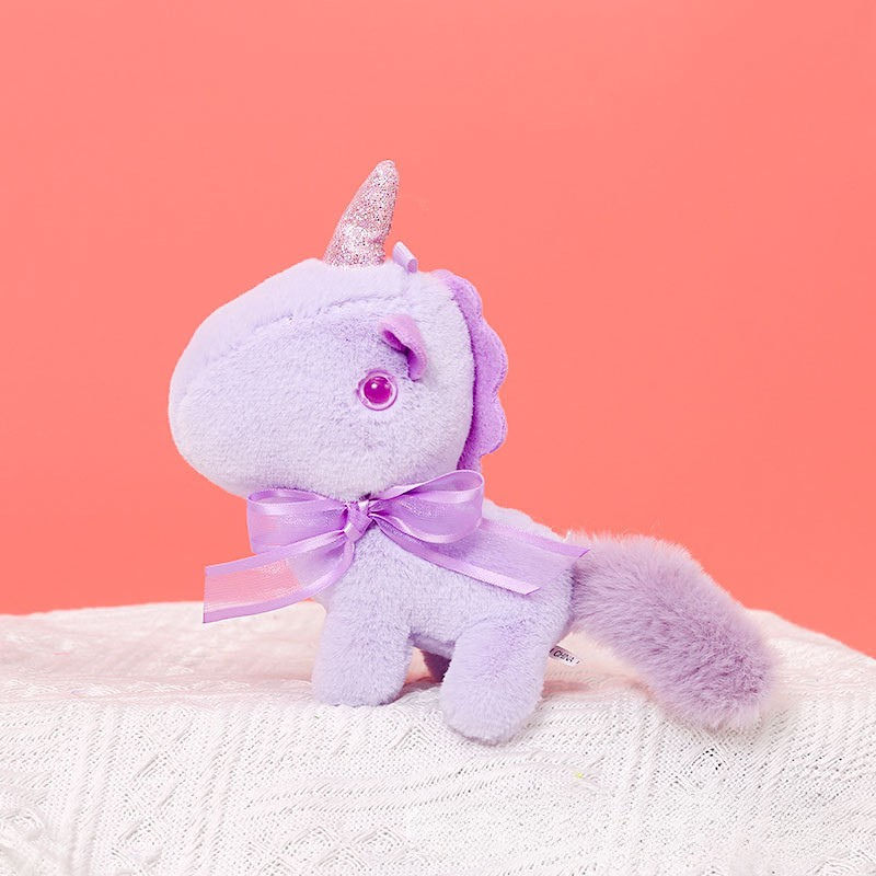 Peluche licorne mini, douce avec nœud et cornet pailleté