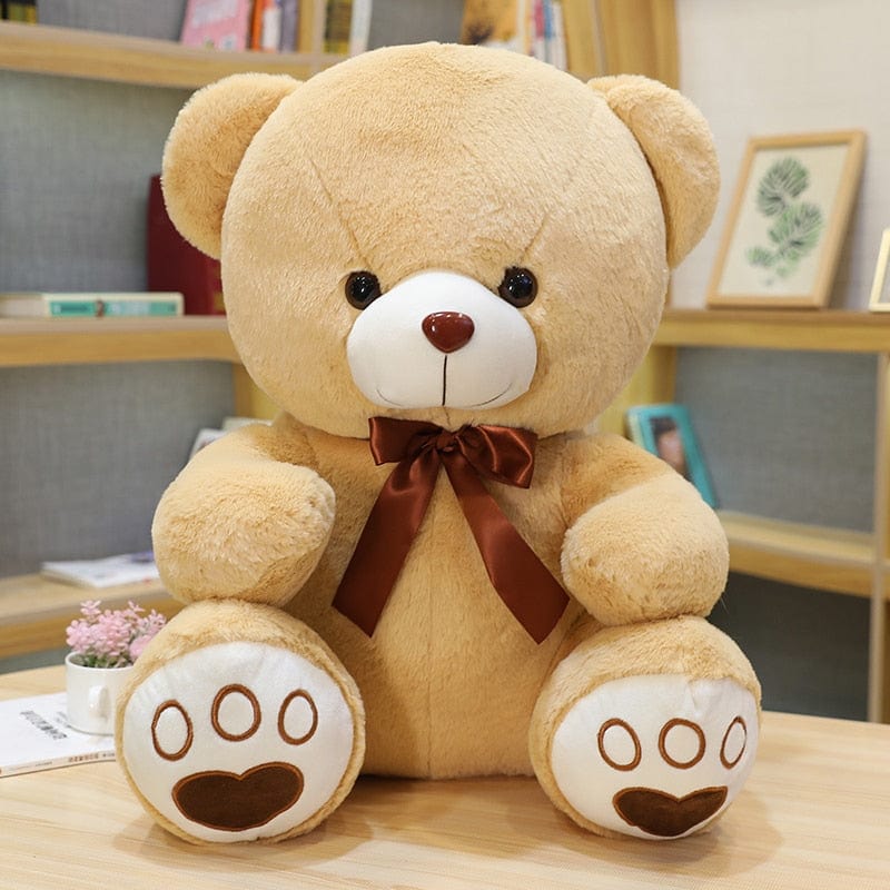 Peluche Ourson Arc-en-ciel avec un délicat nœud
