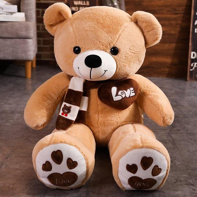 Ours en peluche adorable avec un cœur