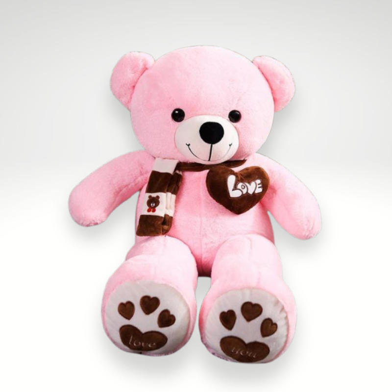 Ours en peluche adorable avec un cœur