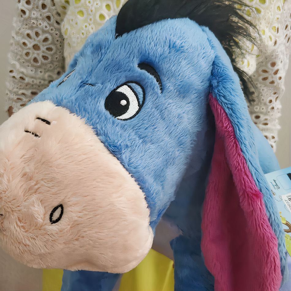 Peluche Bourriquet bleu géant, tout doux pour les câlins.