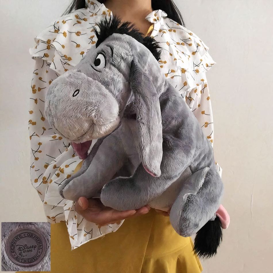 Peluche Bourriquet grand format douce et câline pour enfant