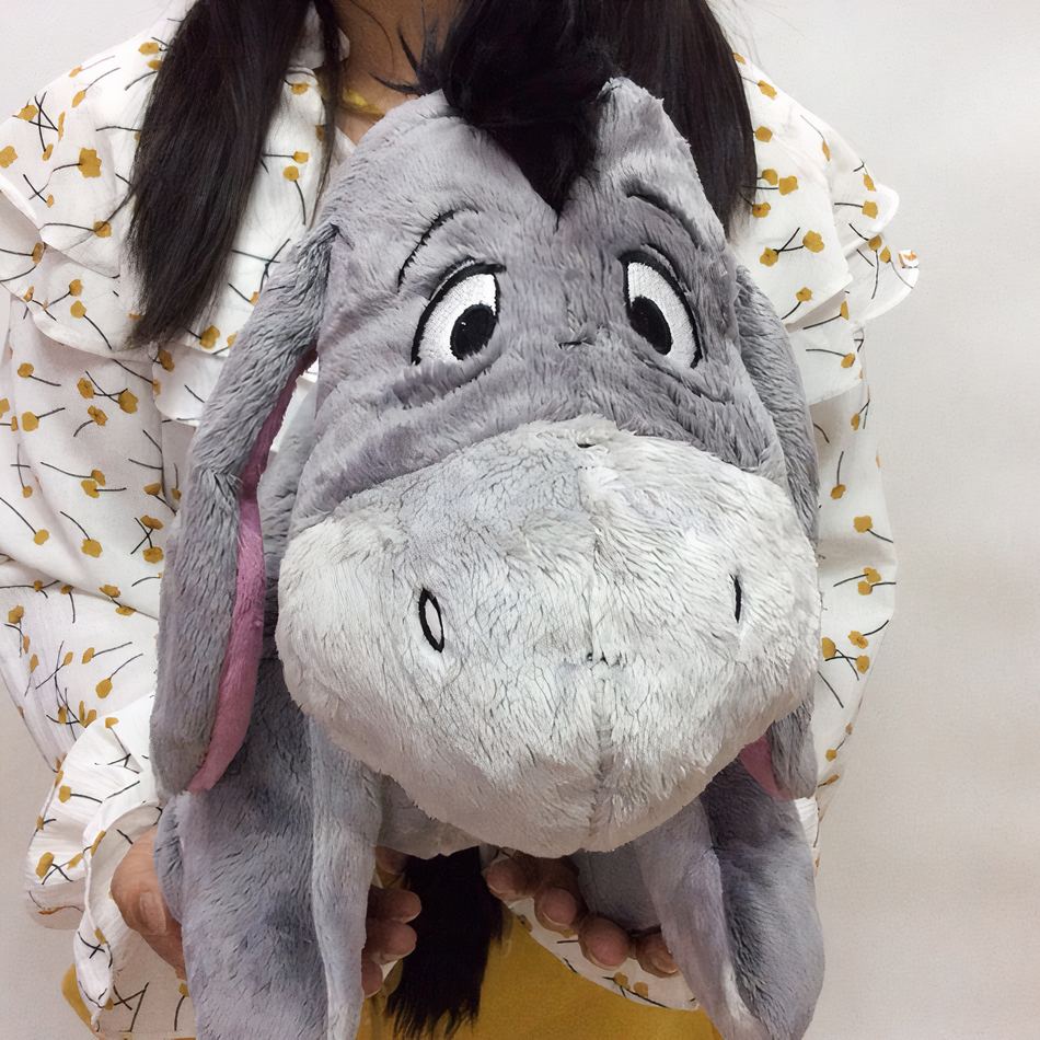 Peluche Bourriquet grand format douce et câline pour enfant