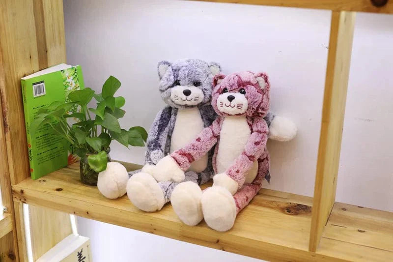 Peluche chat gris assis
