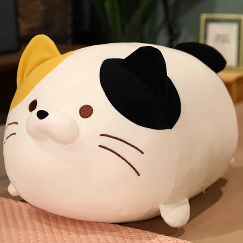 Peluche chat oreiller doux pour une chambre d'enfant cocooning
