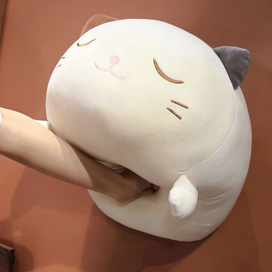 Peluche chat oreiller doux : le confort câlin pour une nuit paisible
