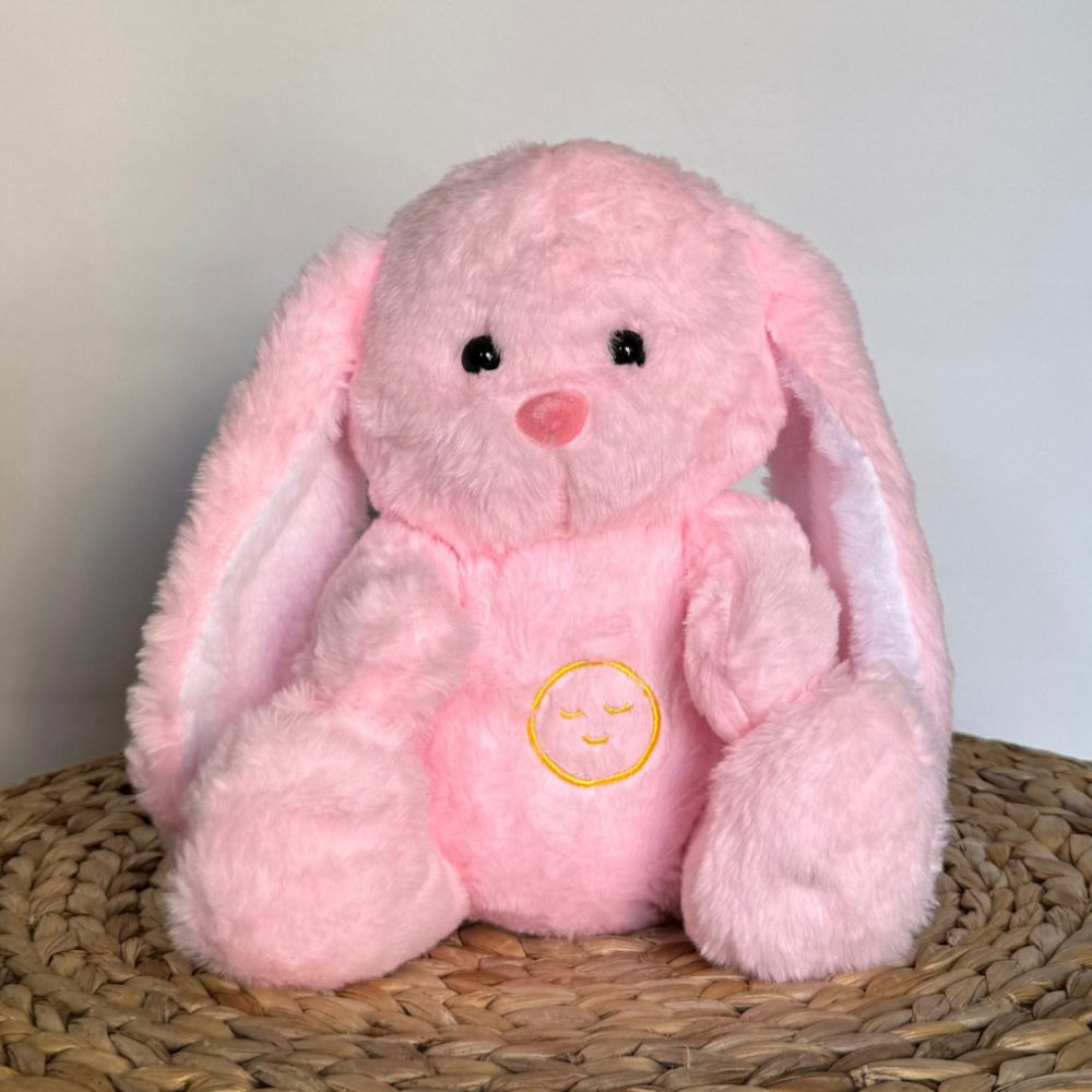 Peluche lapin rose : veilleuse douce pour sommeil d'enfant.