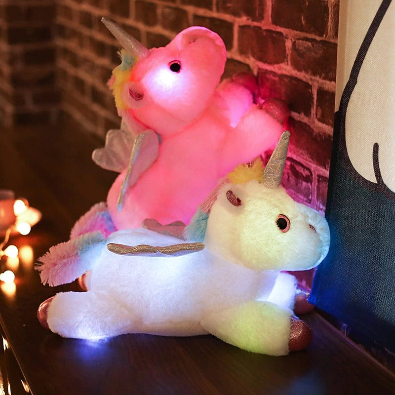 Peluche licorne multicolore lumineuse