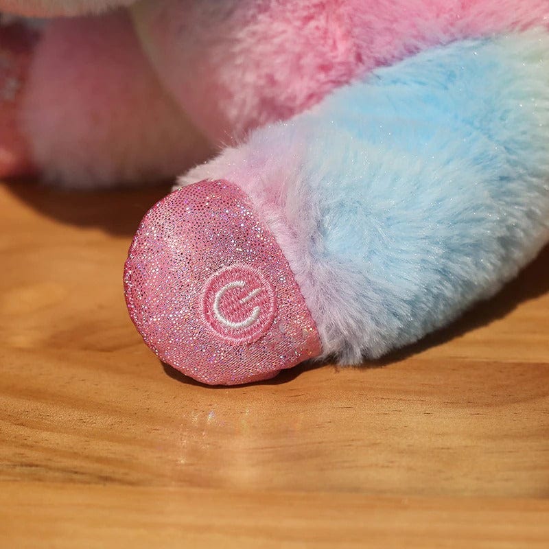 Peluche licorne multicolore lumineuse