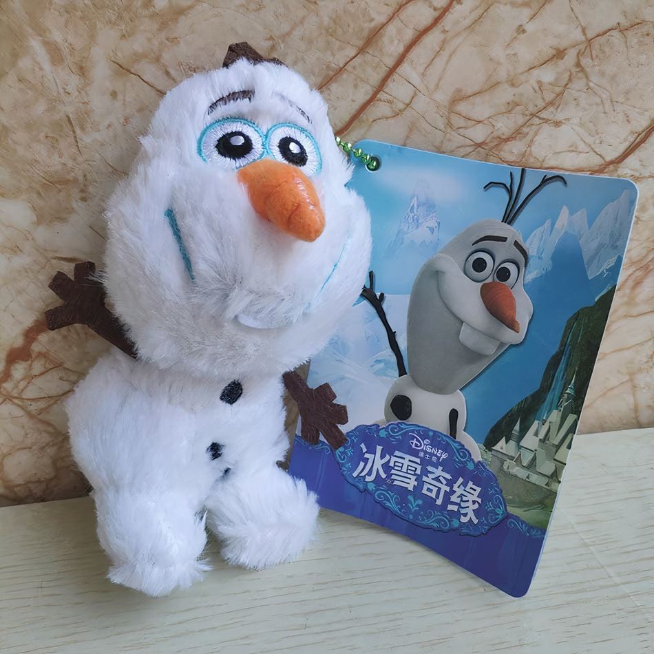 Peluche Olaf Disney : pendentif hivernal câlin