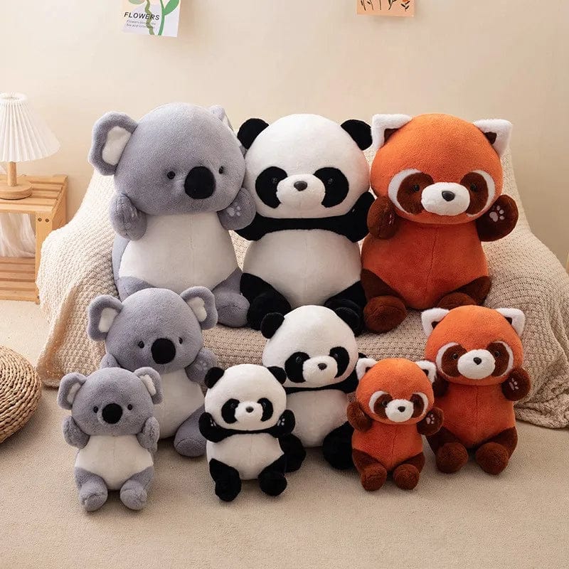 Peluche panda souriant et assis