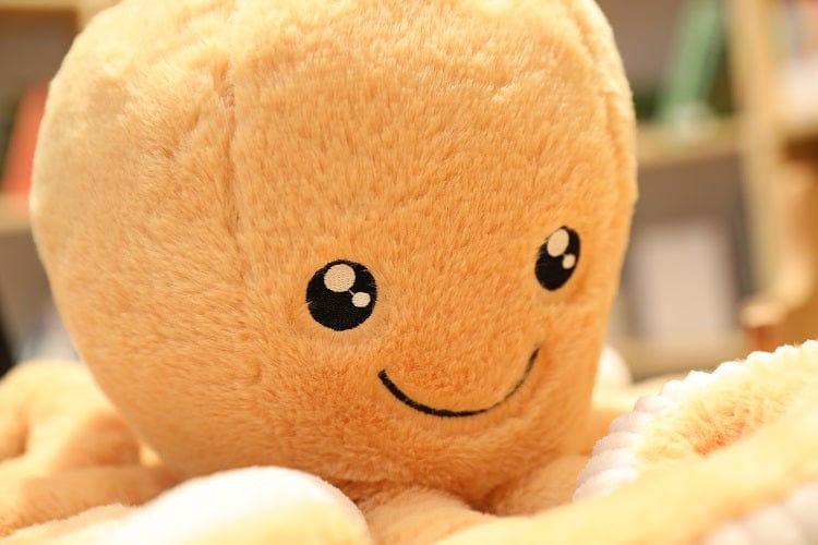 Peluche OctoJoue contente et colorée