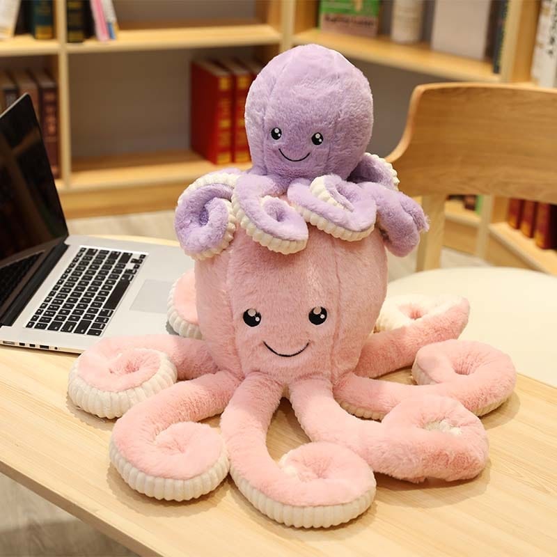 Peluche OctoJoue contente et colorée