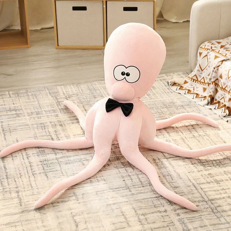 Peluche pieuvre rigolote multicolore douce pour enfant.