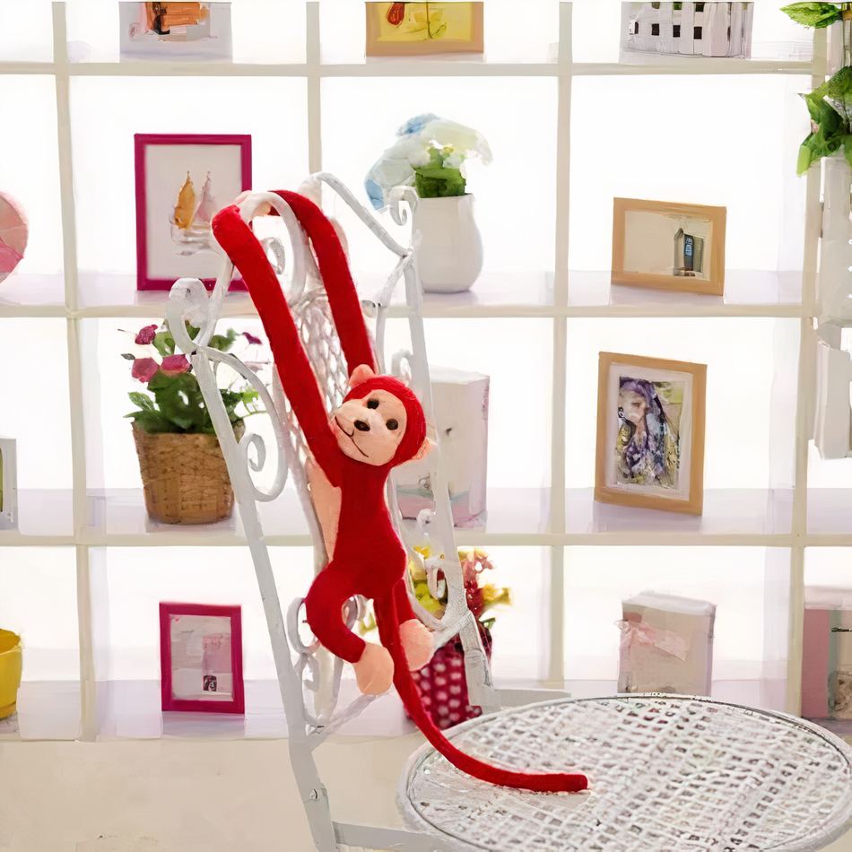 Peluche singe Kawaii avec longue queue rouge -