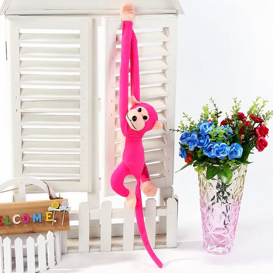Peluche singe kawaii fushia à la longue queue douce pour enfant