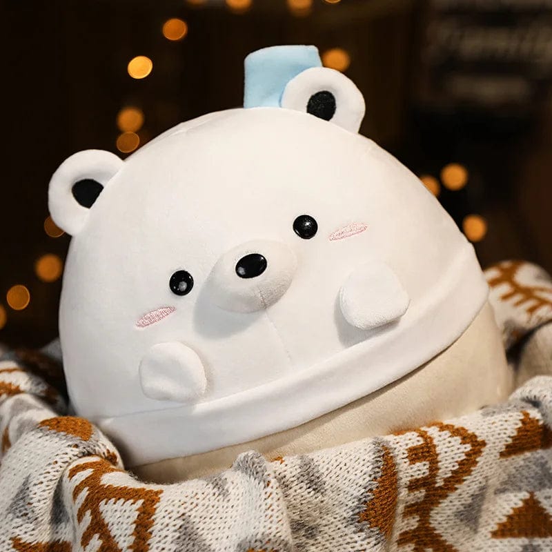 Peluche squishmallow ours blanc dans son bol confort.