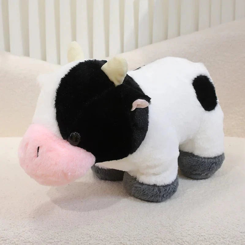 Petite et mignonne peluche vache.
