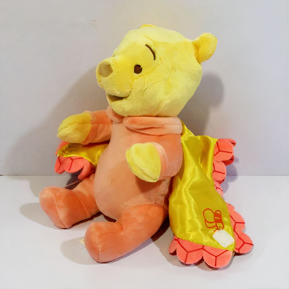 Peluche Winnie l'Ourson : la couverture douce réconfortante pour enfant