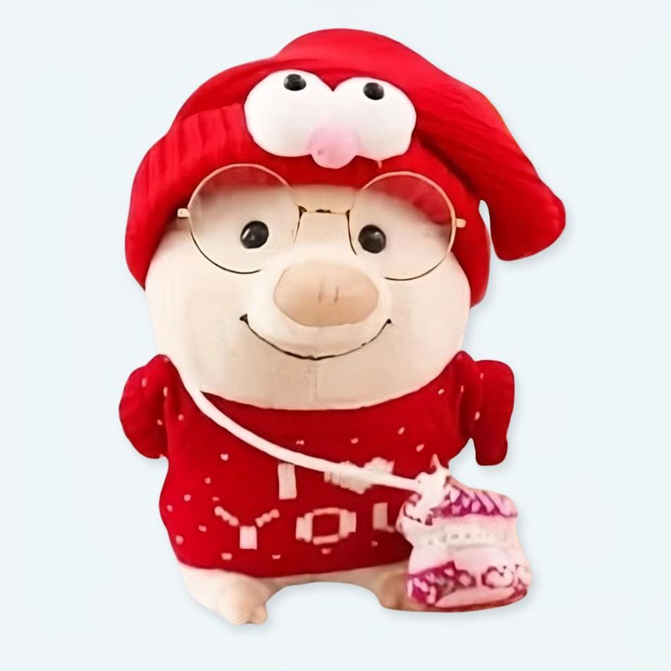 Peluche cochon rose tendre avec un pull doux et un message romantique