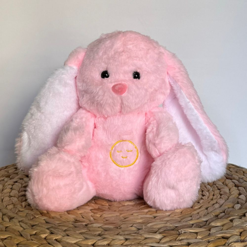 Peluche lapin rose : veilleuse douce pour sommeil d'enfant.