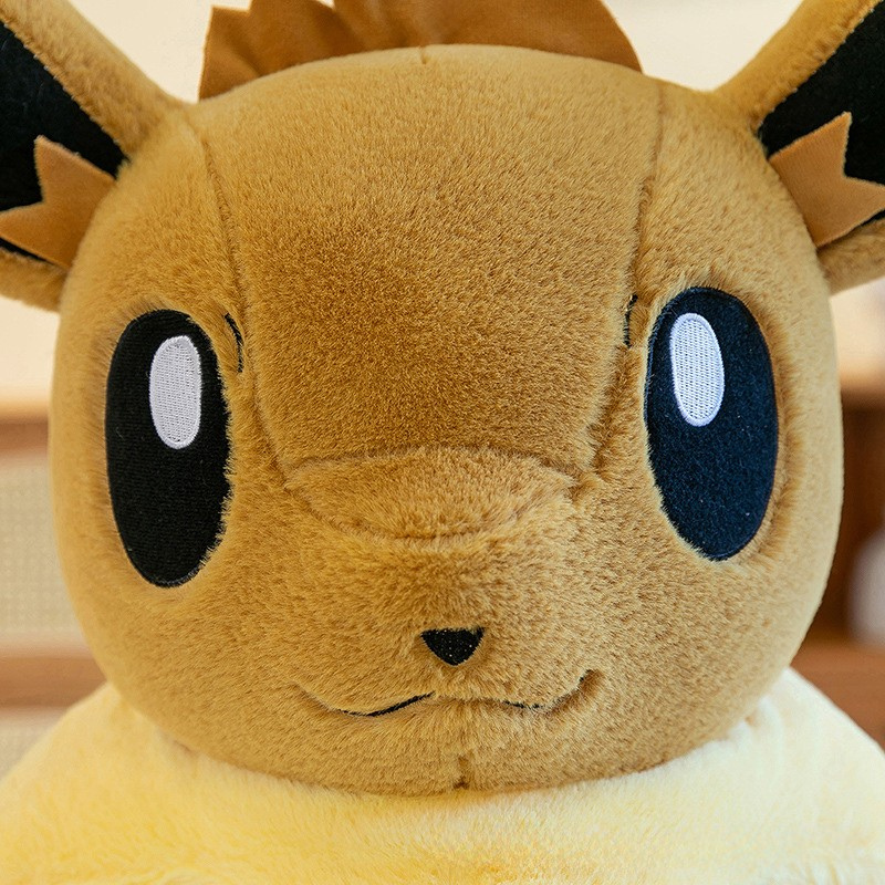 Peluche Évoli Pokémon - Assise toute douce