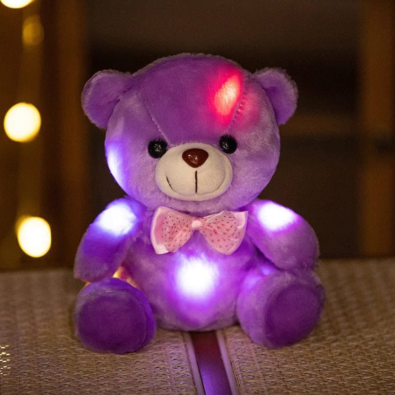 Ours en peluche lumineux avec nœud de papillon scintillant