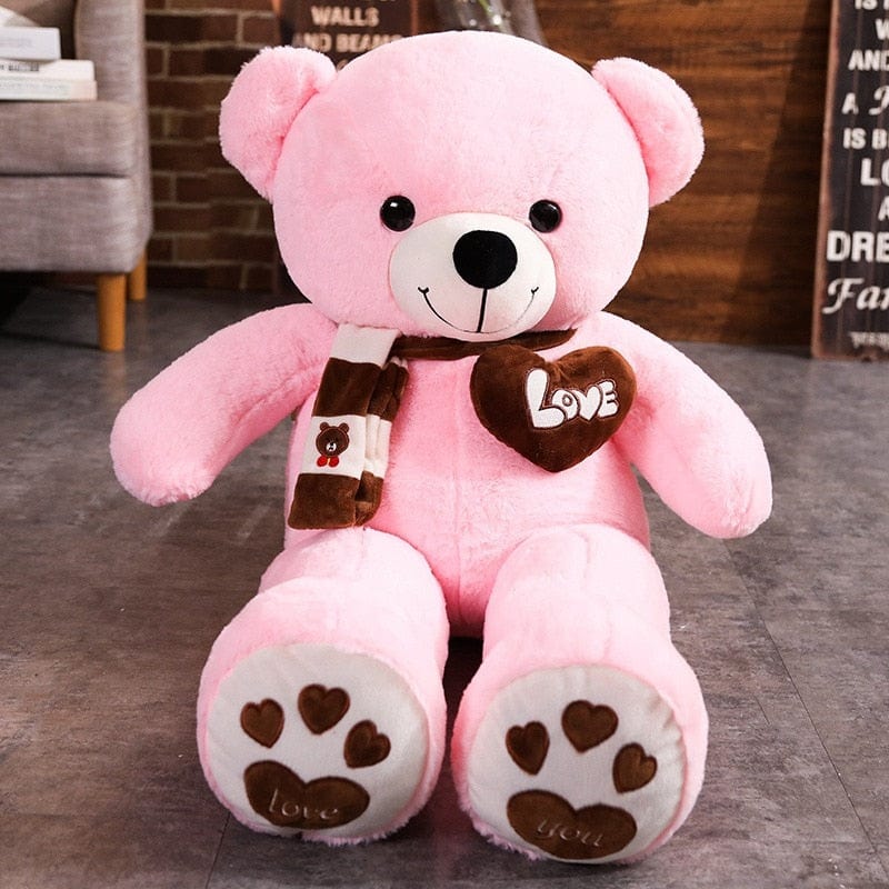 Ours en peluche adorable avec un cœur