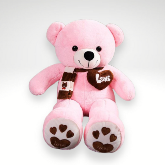 Ours en peluche adorable avec un cœur