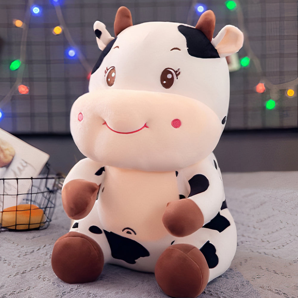 Peluche vache bébé joyeux