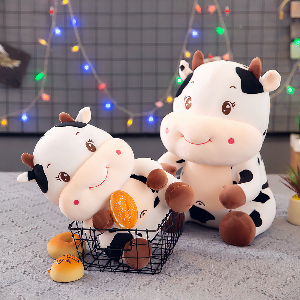 Peluche vache bébé joyeux