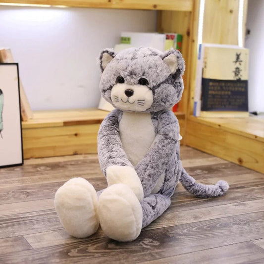 Peluche chat gris assis