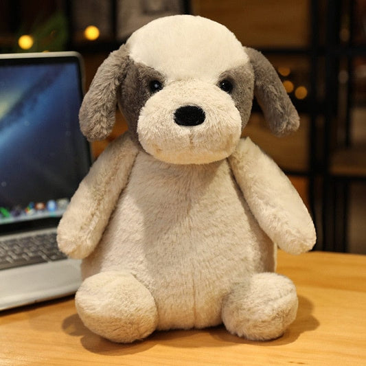 Peluche chien marron clair assis