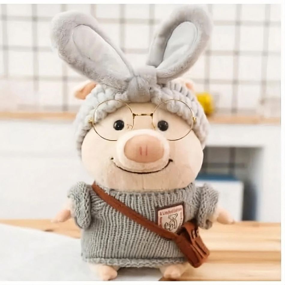 Peluche cochon doux en pull gris hiver chaleureux