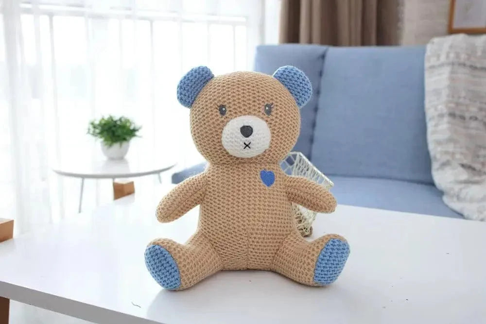 Peluche ourson crochet aux oreilles bleues