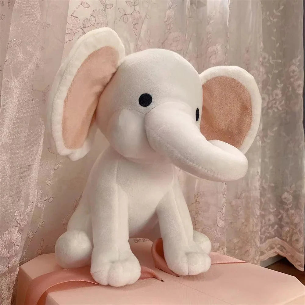 Peluche éléphant coloré avec trompe tordue