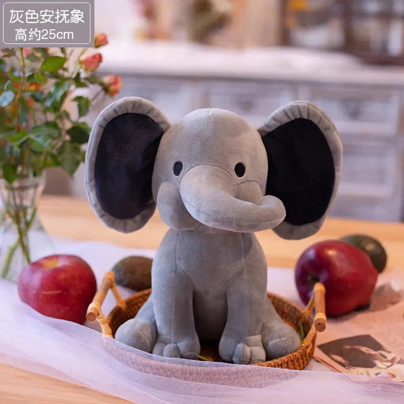 Peluche éléphant coloré avec trompe tordue
