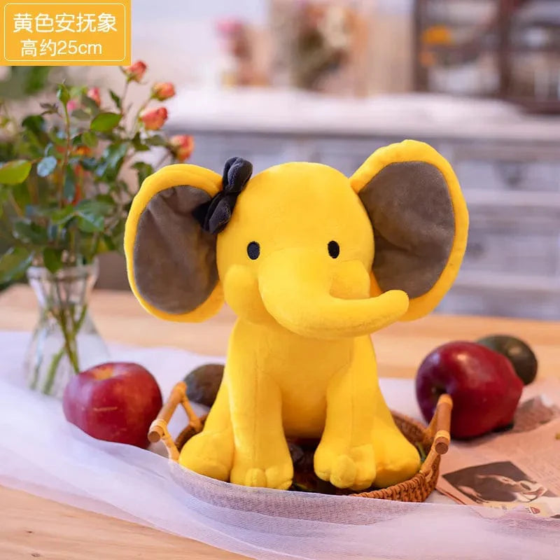 Peluche éléphant coloré avec trompe tordue