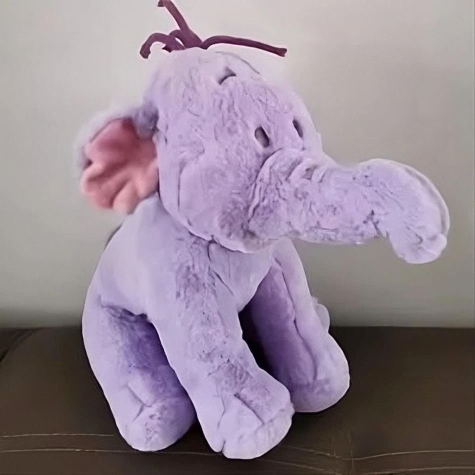 Peluche éléphant violet Disney - Doux câlin pour enfant
