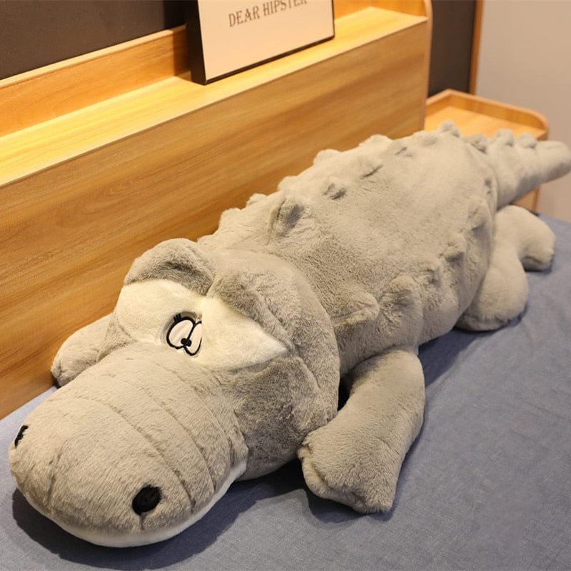 Peluche géante crocodile aux yeux tout ronds