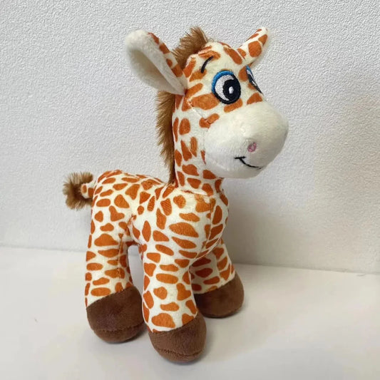 Peluche girafe aux yeux grandioses