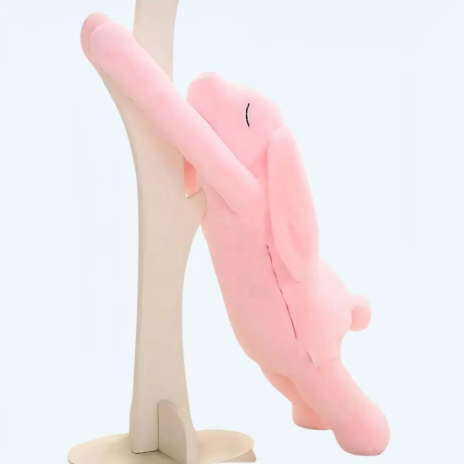 Peluche lapin rose géant, douce et câline pour enfant.