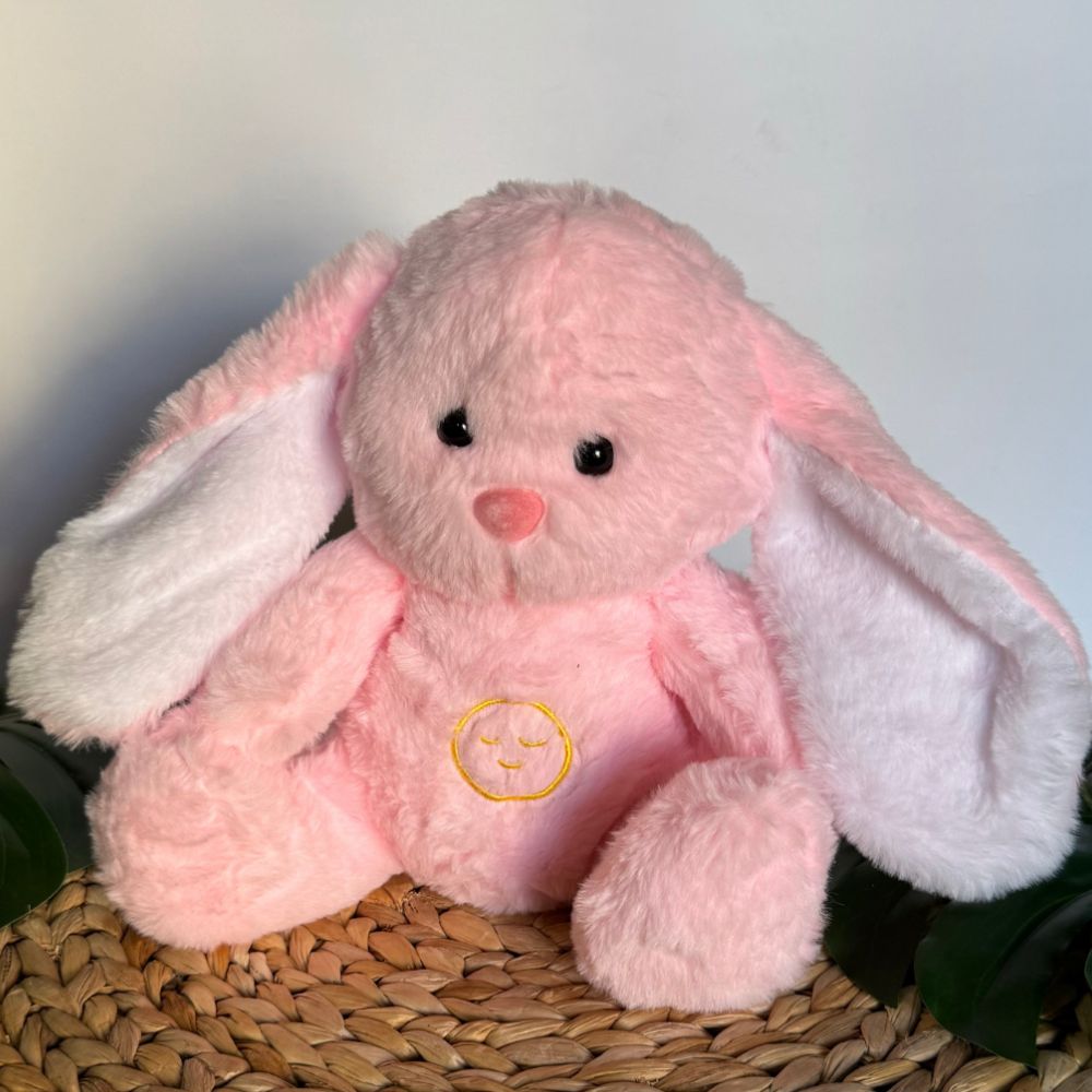 Peluche lapin rose : veilleuse douce pour sommeil d'enfant.