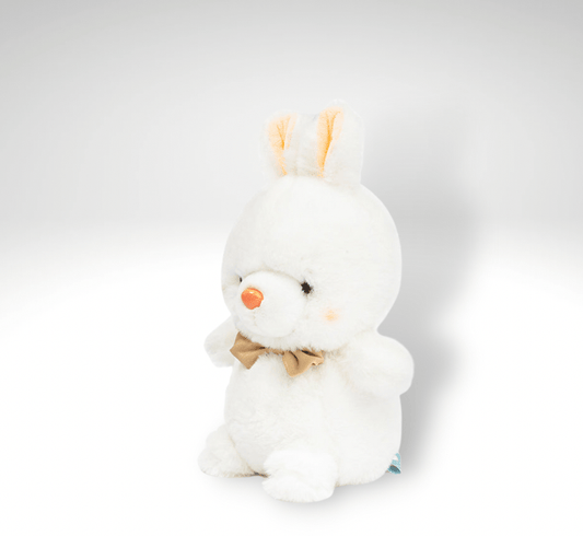 Peluche lapin tout mignon avec un nœud de papillon