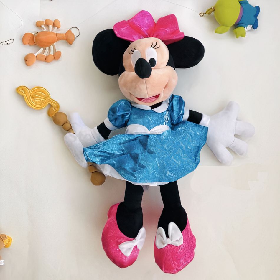 Peluche Minnie Fantasia - Douce Magie pour Enfant Rêveur