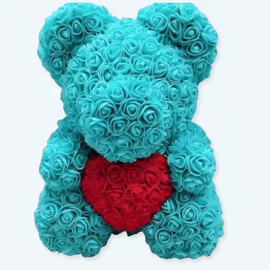 Peluche ourson turquoise câlin pour enfant, idéal cadeau.