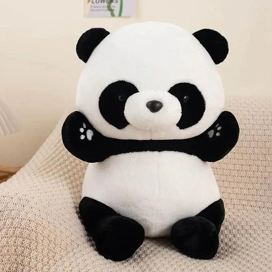 Peluche panda souriant et assis