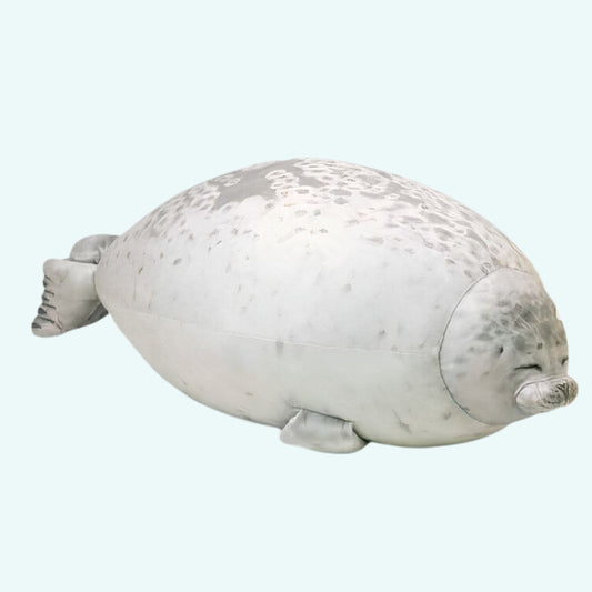 Peluche phoque oreiller cozy et moelleux, parfait pour l'hiver