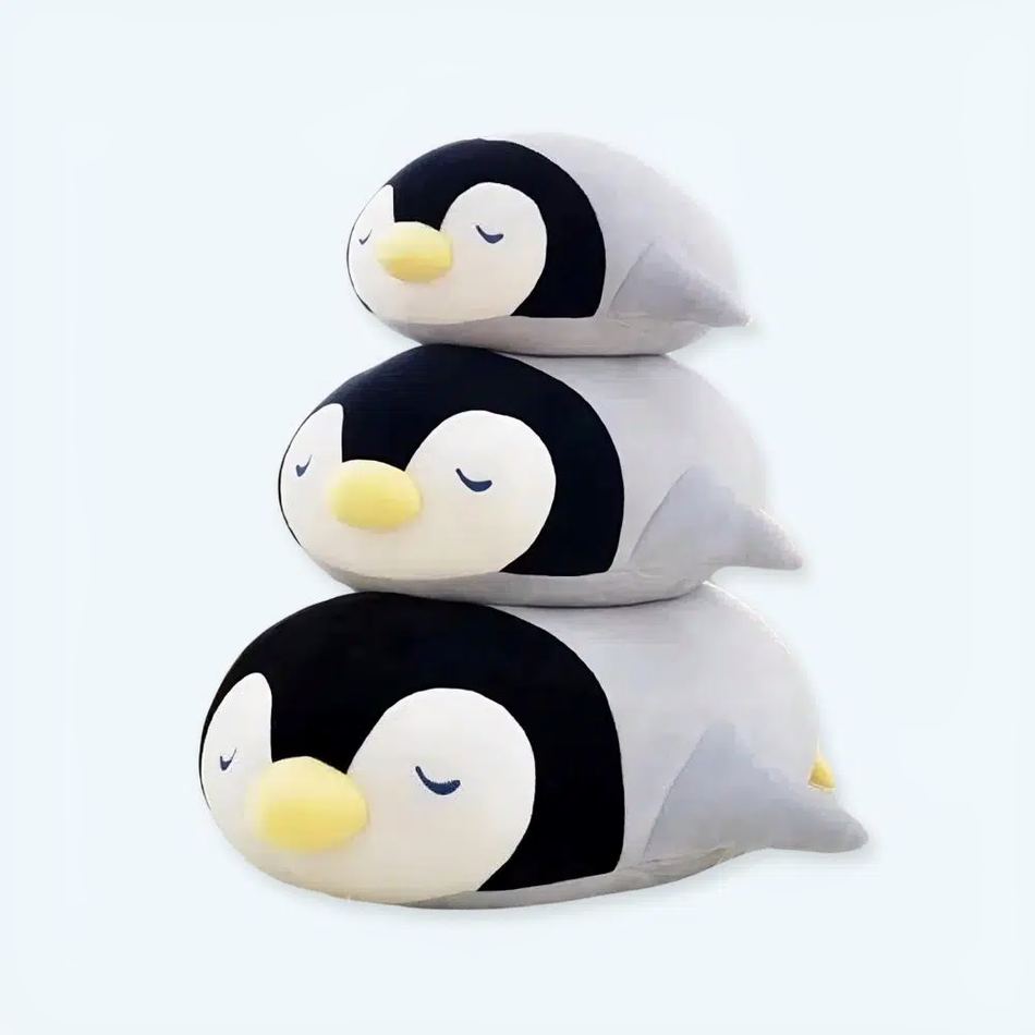 Peluche pingouin dodo câlin pour une douce nuit d'hiver